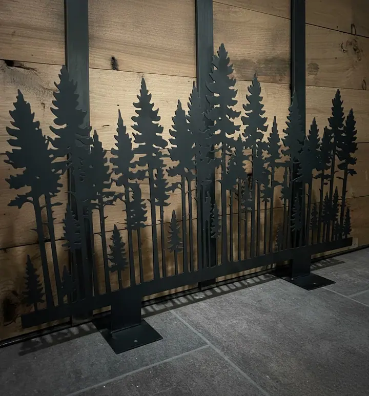 Tree-line silhouette screen laser-cut from steel